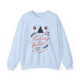 Light blue 'Feeling Festive' Christmas sweatshirt with tree and ornaments graphic.
