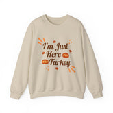 Beige sweatshirt with "I'm Just Here For The Turkey" graphic.