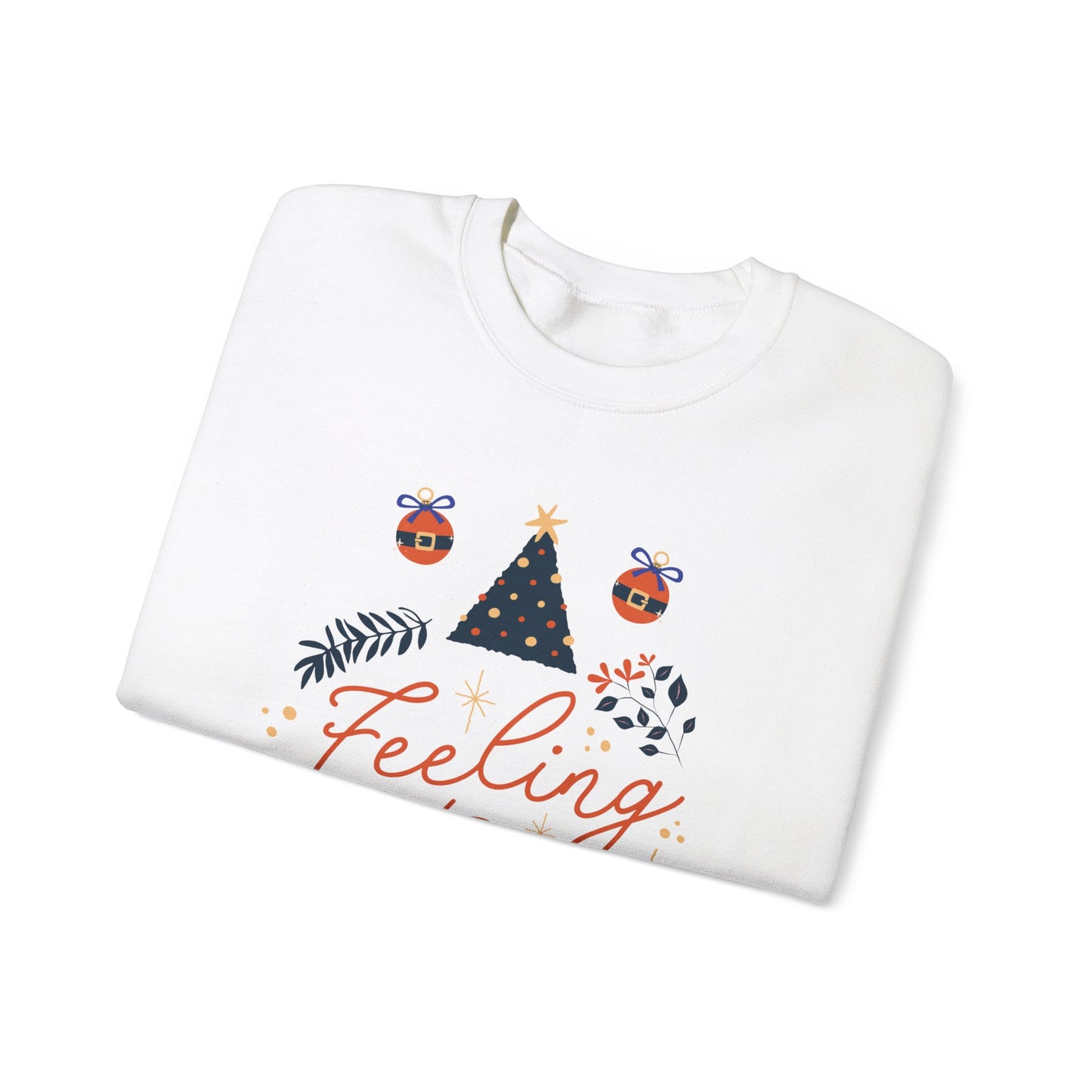 White sweatshirt with 'Feeling' script and Christmas-themed tree and ornament graphics.