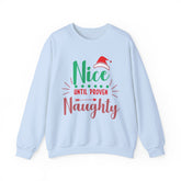 Light blue sweatshirt with the phrase "Nice Until Proven Naughty" in green and red, featuring a Santa hat.