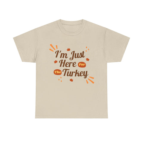 Beige t-shirt with 'I'm Just Here For The Turkey' design for Thanksgiving.