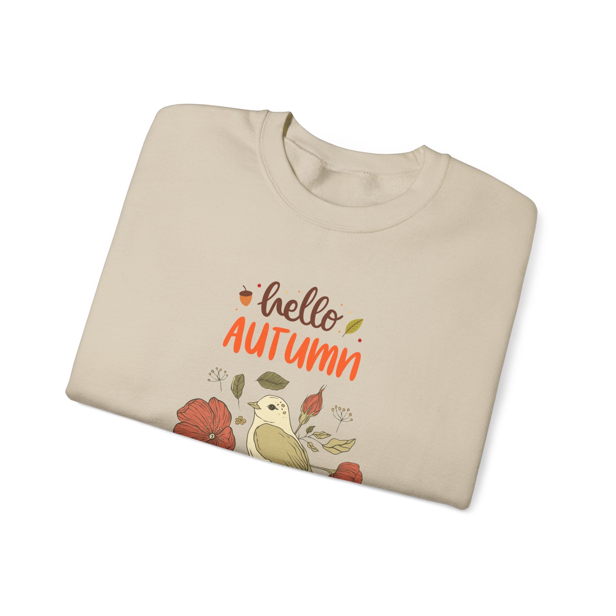 Beige sweatshirt with 'hello autumn' graphic, featuring flowers and a bird illustration.