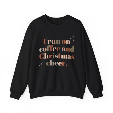 Black Christmas sweatshirt with 'I run on coffee and Christmas cheer' quote.