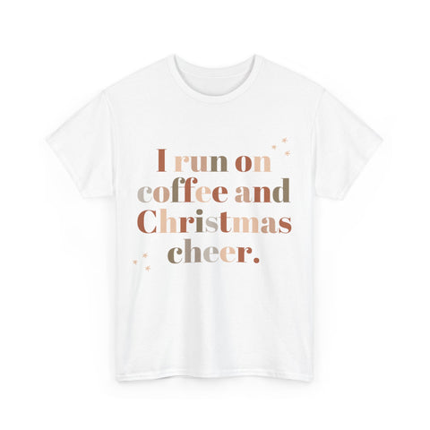 White t-shirt featuring the phrase 'I run on coffee and Christmas cheer' in brown, beige, and tan lettering.