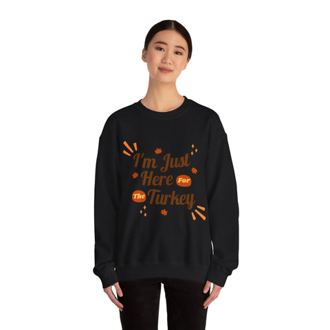Woman in black 'I'm Just Here for the Turkey' Thanksgiving sweatshirt.