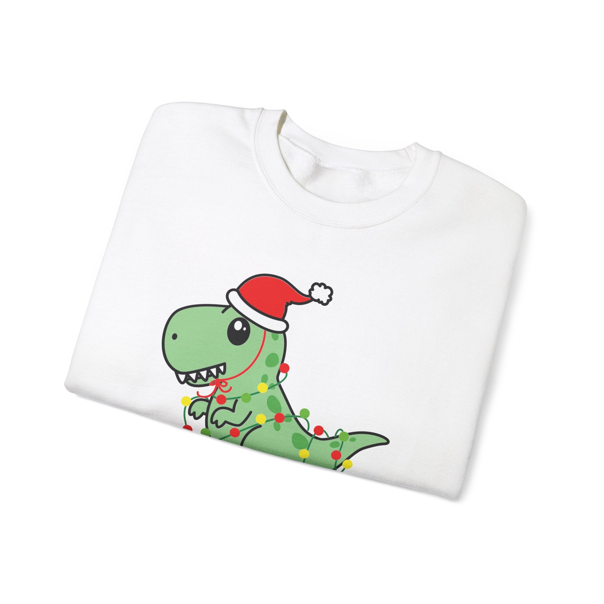 White sweatshirt featuring a cartoon dinosaur wearing a Santa hat and Christmas lights.