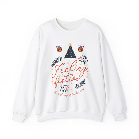 White sweatshirt with 'Feeling Festive' design, featuring a Christmas tree, ornaments, and festive foliage.