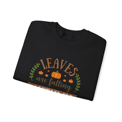 Black sweatshirt with 'Leaves are falling' design featuring a pumpkin and autumn leaves.