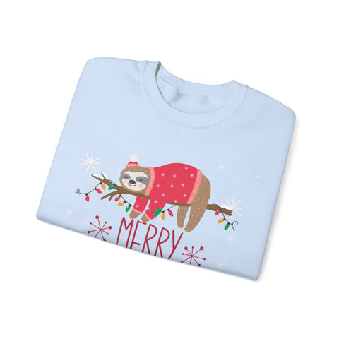 Light blue sweatshirt with sloth wearing a Christmas hat and sweater, laying on a branch with lights. 'Merry' text.
